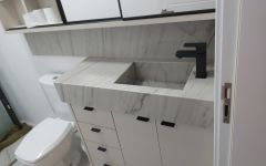 Tampo com cuba de pedra  em Quartzito Denalli