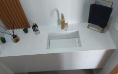 Tampo com cuba esculpida em Carrara Prime/Ariston
